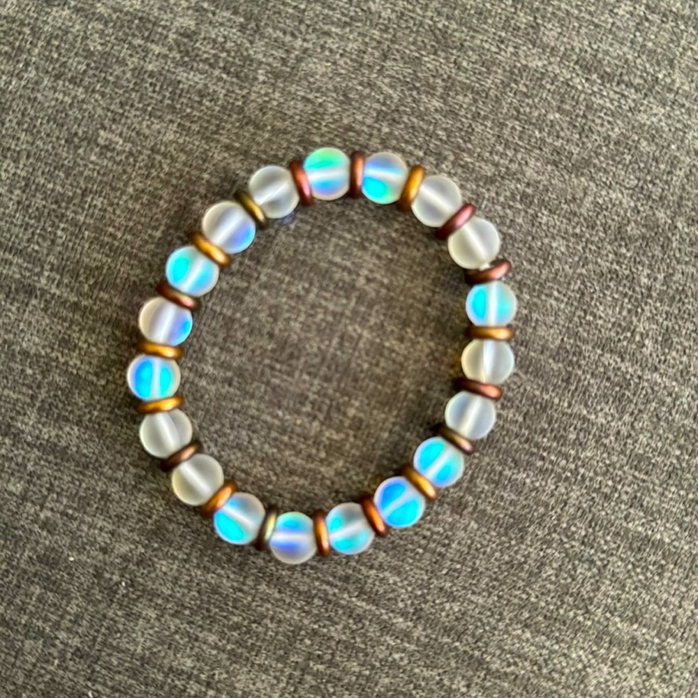 Handmade bracelet with gold acrylic and iridescent glass beads